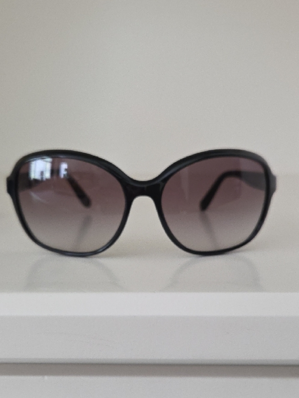 Prada Women’s Black Frame Sunglasses with Smoky Lenses - Picture 5 of 6